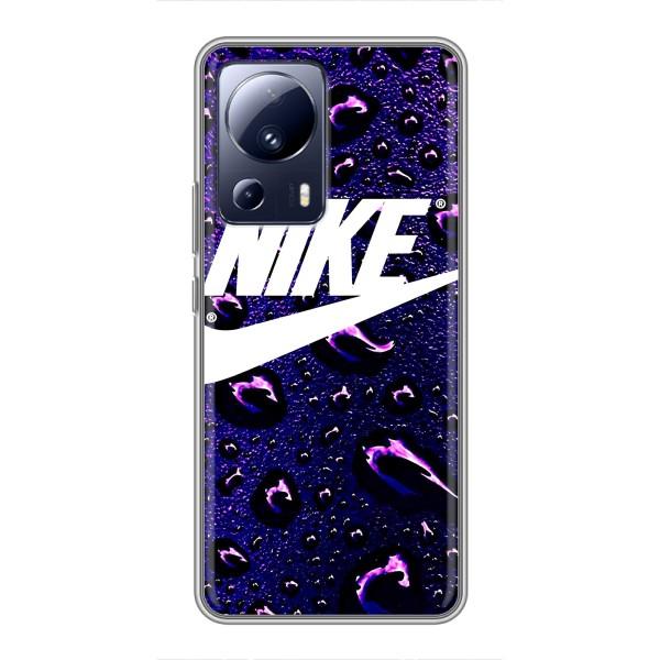 Чохол з логтипом Найк на Xiaomi 13 Lite – Найк на фіолетовому