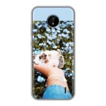 Чехлы с изображением разных животных для Nokia C10 (Ежик на руках)